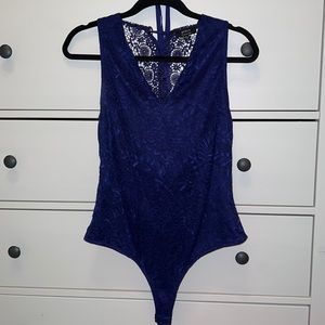 Blue bodysuit with lace tie-back—great condition!